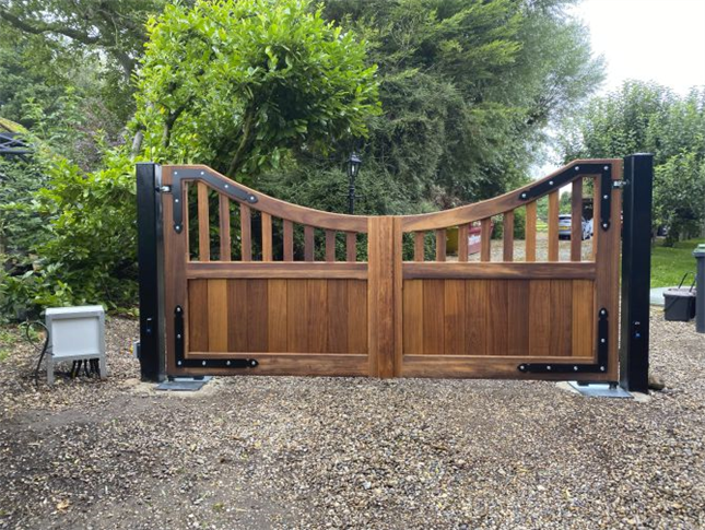 Double leaf Iroko hardwood deep dropped bow swing gates